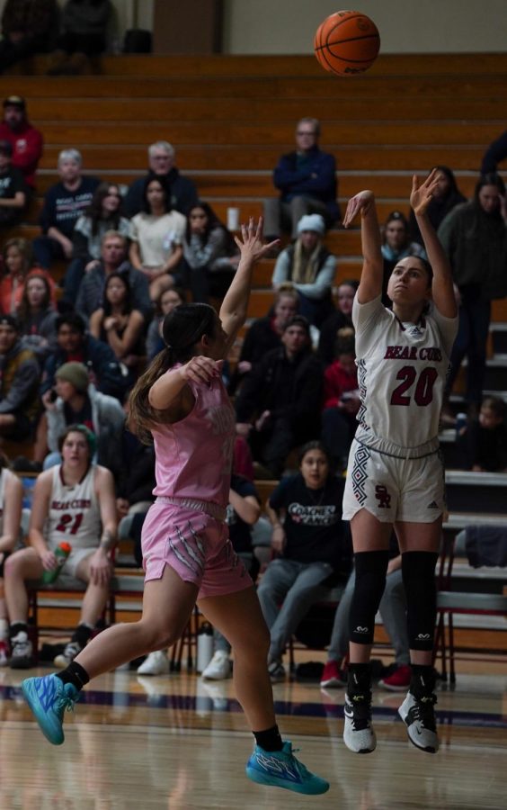 Santa Rosas Sheriene Arikat shoots a mid-range jumper over a Sierra defender on Feb. 10. 