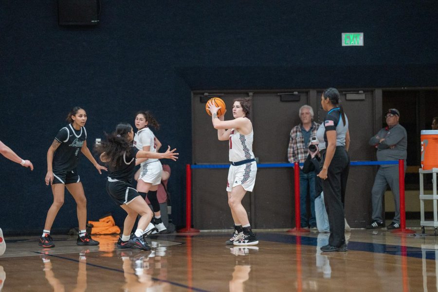 Guard Alex Ditizio looks to pass the ball to an open teammate during the second quarter of the game against Laney College Saturday, March 4 in Santa Rosa. 