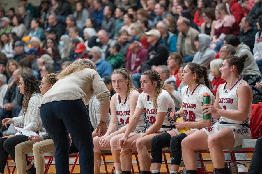 Coach Lacey Campbell speaks to several players on the bench during the second quarter of the game against Laney College Saturday, March 4 in Santa Rosa. 