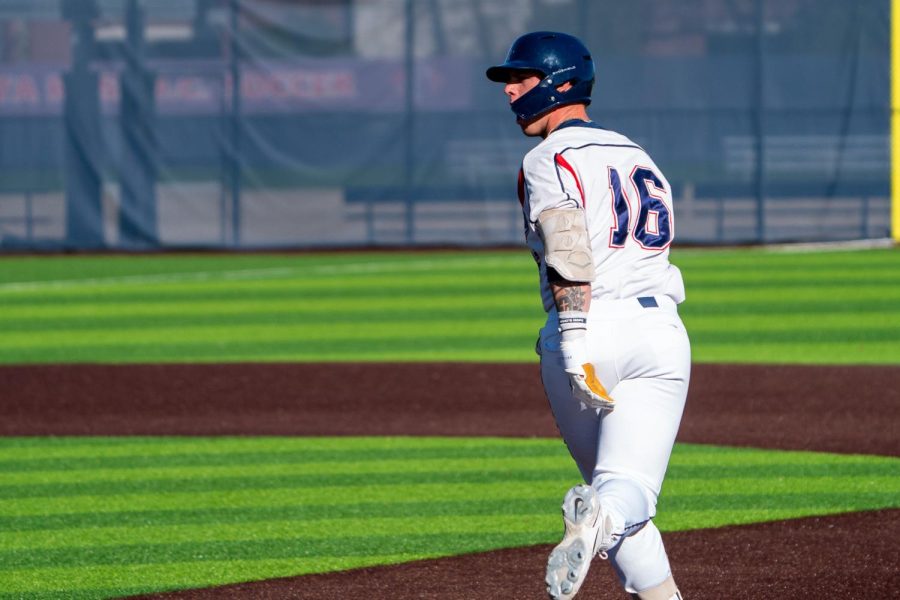 Bear Cubs Jake McCoy rounds first base and looks back and yells at his roaring dugout after his homerun gave Santa Rosa the lead against San Joaquin Delta.