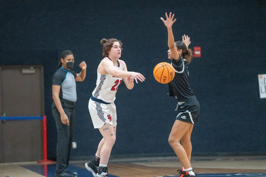 Guard Alex Ditizio passes the ball inbounds during the fourth quarter of the game against Laney College Saturday, March 4 in Santa Rosa. 