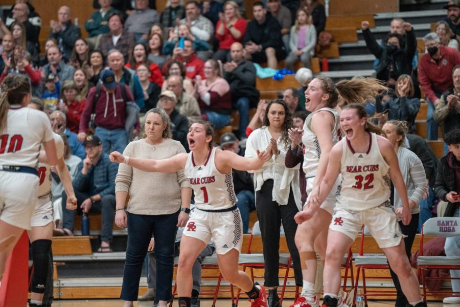Guard+Lucca+Lowenburg+and+Forward+Meredith+Gilbertson+celebrate+as+time+expires+in+SRJC+Womens+Basketball+team+71-46+victory+over+Laney+College+Saturday%2C+March+4+in+Santa+Rosa.+That+game+sent+the+Bear+Cubs+to+the+state+championship+tournament%2C+where+they+won+their+first+game+and+are+playing+a+semi-final+game+March+11.