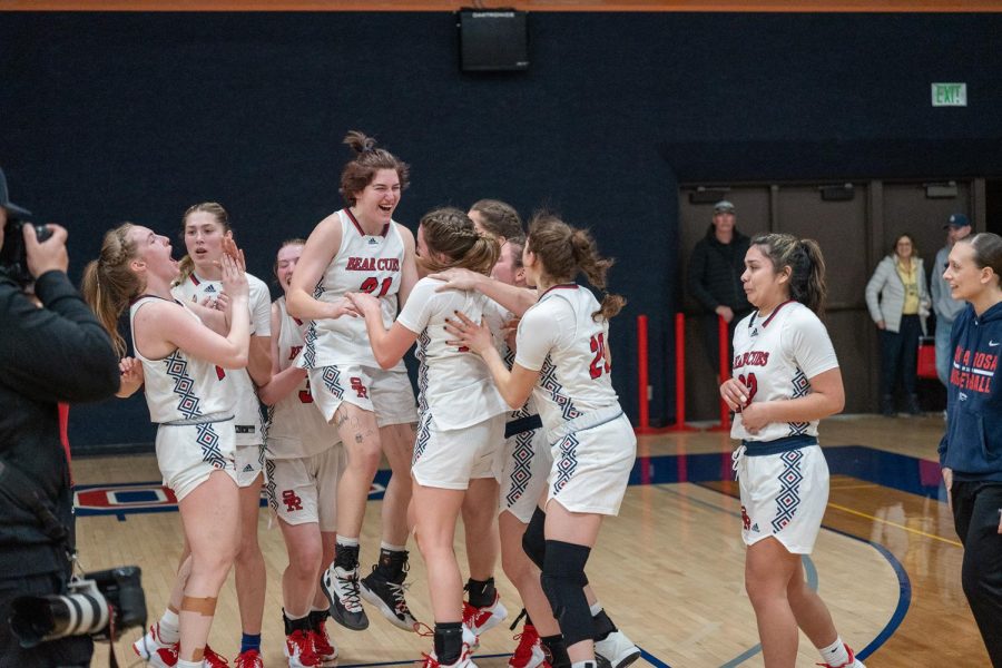 The SRJC Womens Basketball team celebrates as they move on to play in the state championship series following their 71-46 victory over Laney College Saturday, March 4 in Santa Rosa.