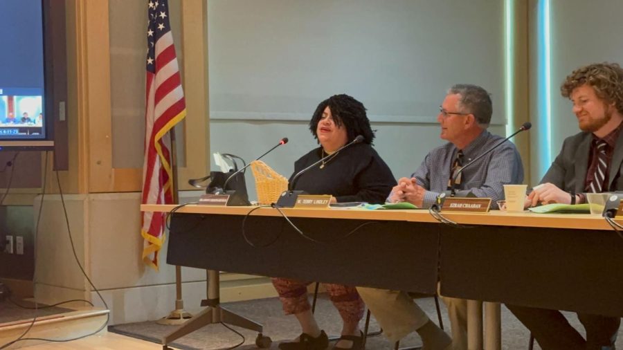 Delashay Carmona Benson (on the left, next to Board of Trustee Members Terry Lindley, middle, and Ezrah Chaaban, right) announces her resignation as SRJC Student Trustee at the April 11 after a year of conflict with college officials.