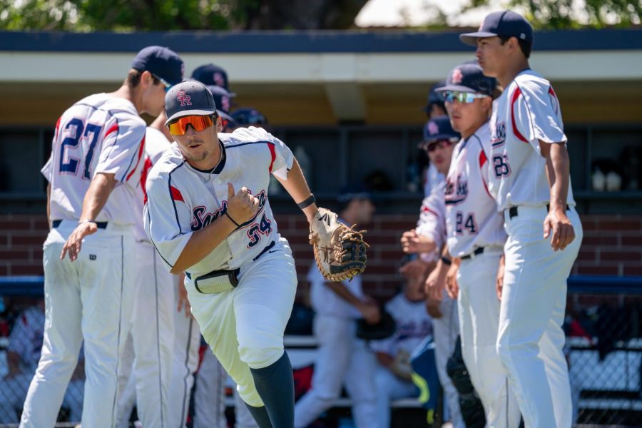 Bear Cubs dual threat Connor Charpiot runs out onto the field before their game against Cañada College on Thursday, May 11, 2023 in Santa Rosa.
