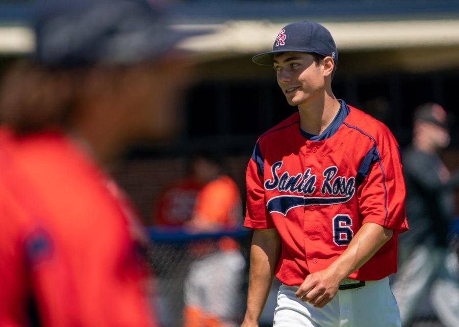 Bear Cubs pitcher Evan Johnson is all smiles after pitching out of a bumpy seventh inning against Reedley College on Friday, May 12, 2023 in Santa Rosa.