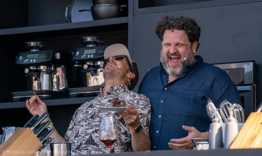 Olympic Gold Medal Skier Johnny Moseley, left, and Chef Aaron May burst with laughter after tasting their bread pudding dessert at the BottleRock Culinary Stage on Friday, May 26, 2023 in Napa.