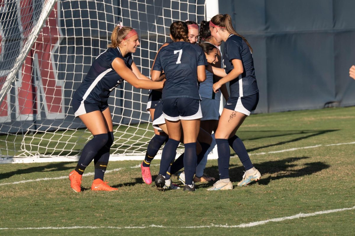Teammates help Bear Cubs defender Marisol Vargas up after she tumbled and scored the teams 5th goal against Diablo Valley on Tuesday, Oct. 24, 2023 in Santa Rosa.