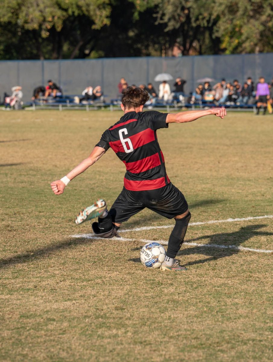 Bear Cubs midfielder Sam Nolan attempts a goal against Cañada College on Nov. 21 at Santa Rosa Junior College. During the second half, he and other Bear Cubs players increased their aggression against the Cañada Colts.