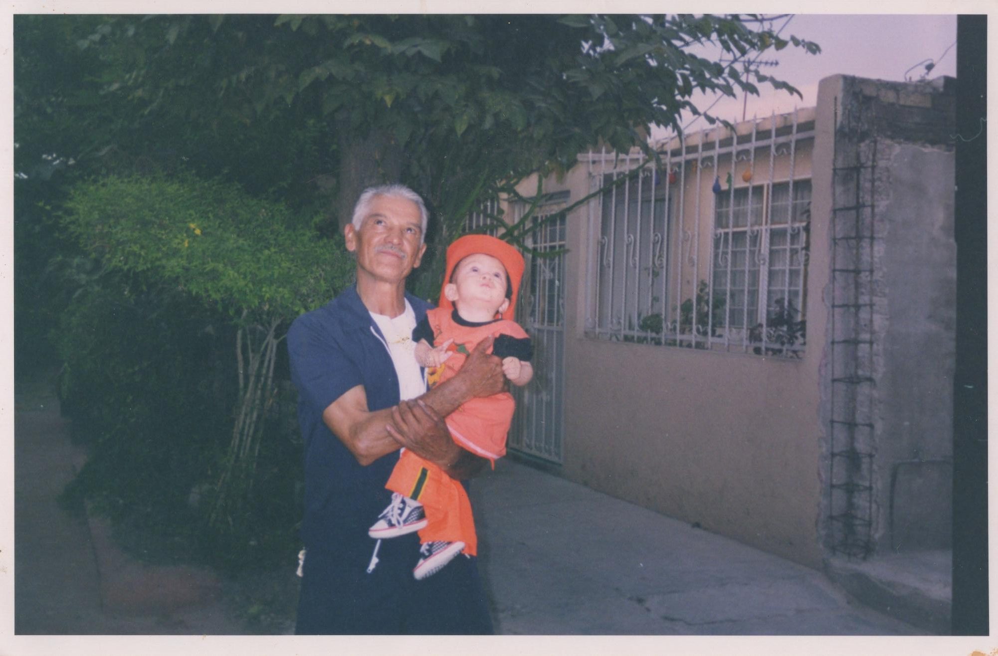Max Millan’s abuelito, Gonzalo, a native of Toluca, holds him up as a toddler as they look towards an early 2000s Mexico City sky. Along with his wife, Millan’s abuelita Teresa, Gonzalo remains a fixture in his grandsons memories. From suffering from the vices of alcoholism to evolving into a faithful Christian, Gonzalos life has inspired Millan, even more so now that he’s become his last living grandparent.
