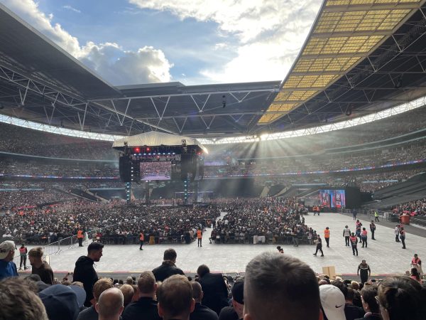 
The sun shines through the rafters at Wembley Stadium as FTR wrestles the Young Bucks for the AEW Tag Team Championships on Sunday, Aug. 27, 2023 in London, England.