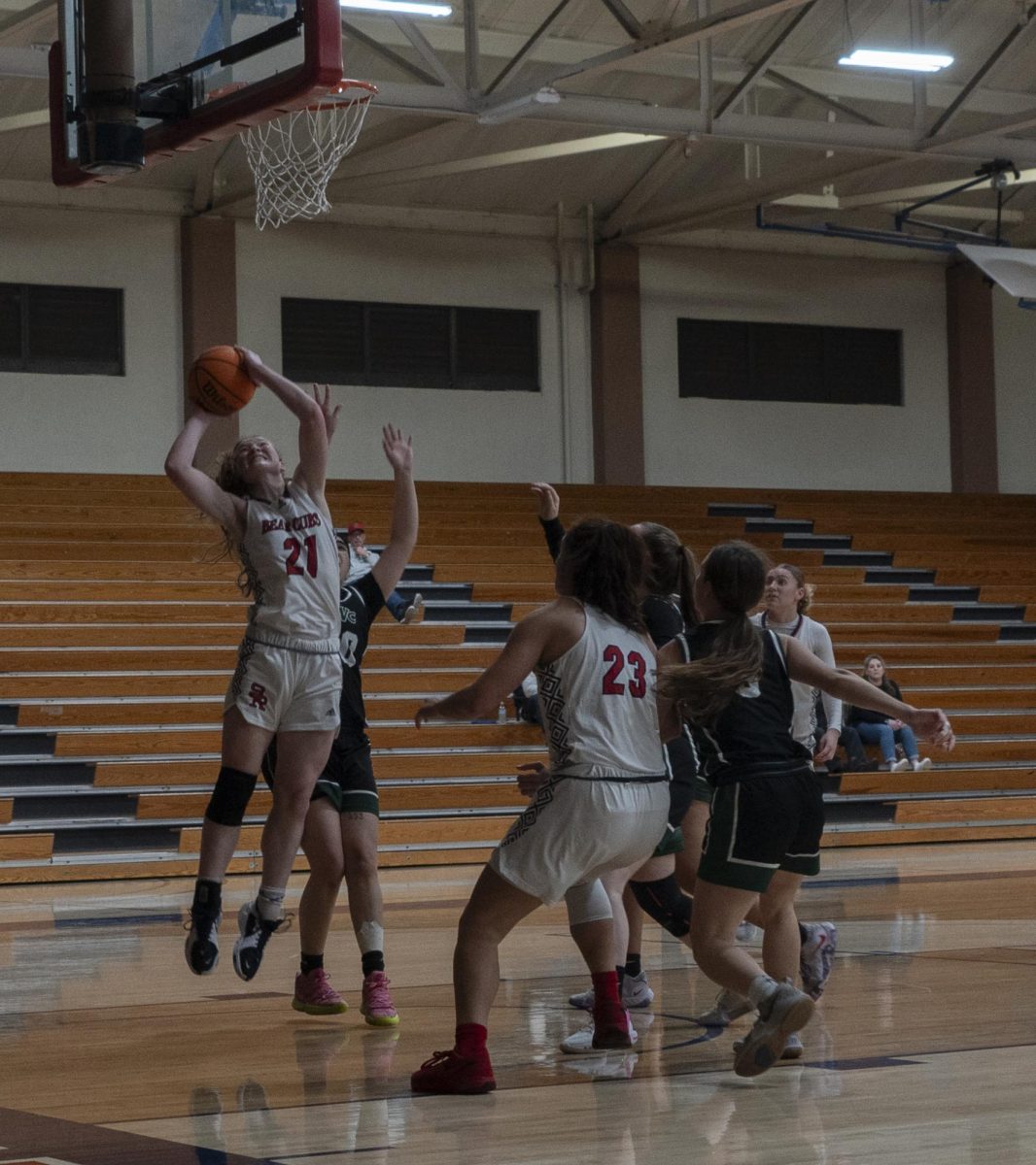 SRJC Forward Meredith Gilbertson attempts the putback layup after grabbing an offensive rebound in a postseason game against Diablo Valley College at Santa Rosa’s Haehl Pavilion Jan. 23, 2024.