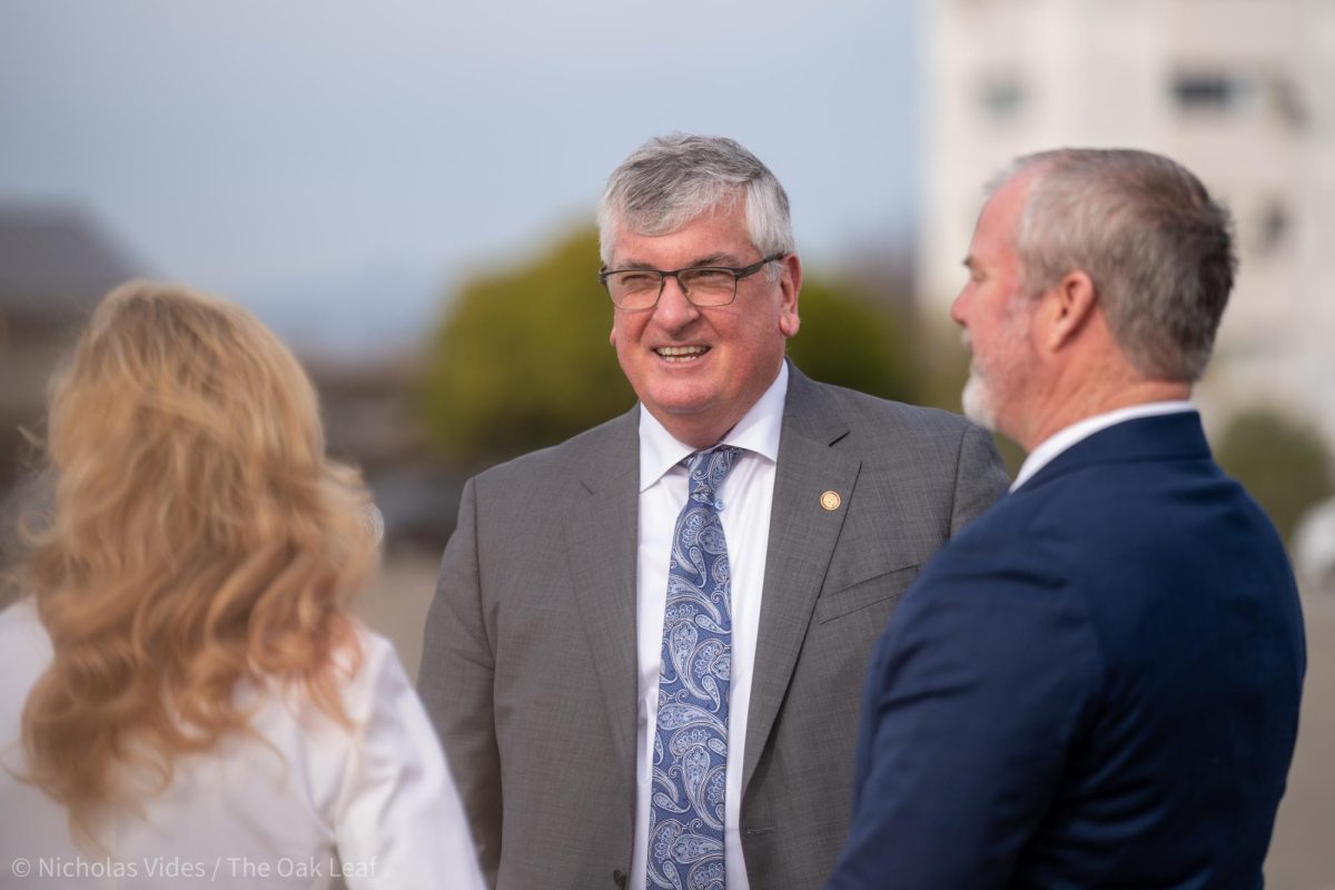 Sonoma County District 2 Supervisor David Rabbitt, middle, awaits First Lady Dr. Jill Biden’s arrival at the Charles M. Schulz-Sonoma County Airport on Thursday, Jan. 18, 2024 in Santa Rosa.