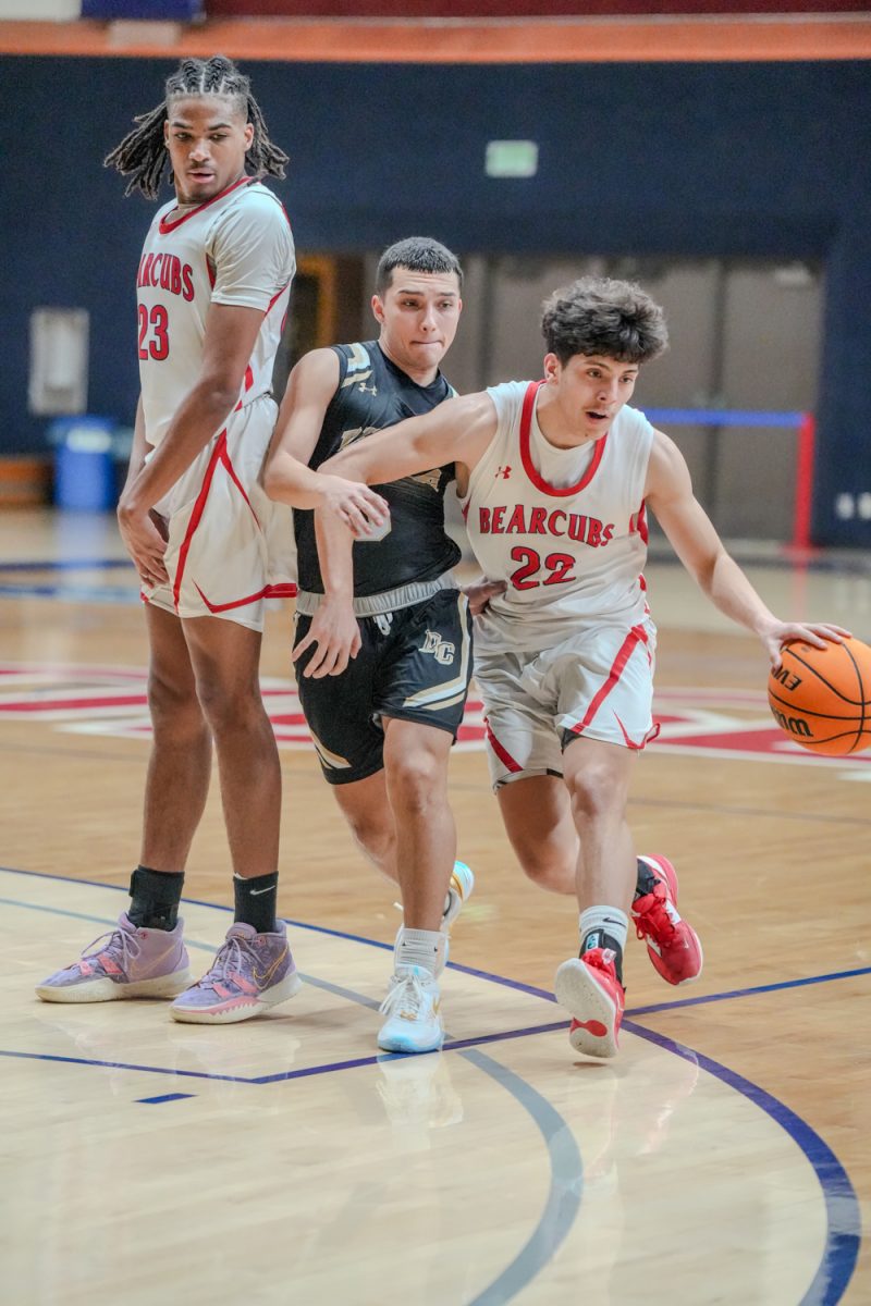 SRJC guard Andrew Pengel works to shake his defender with the help of a screen from teammate Stephen Ransom at Santa Rosa’s Haehl Pavilion Feb. 2, 2024