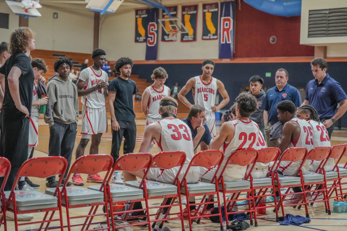 SRJC head coach Craig McMillan speaks to his team after the first quarter at Santa Rosa’s Haehl Pavilion Feb. 2, 2024