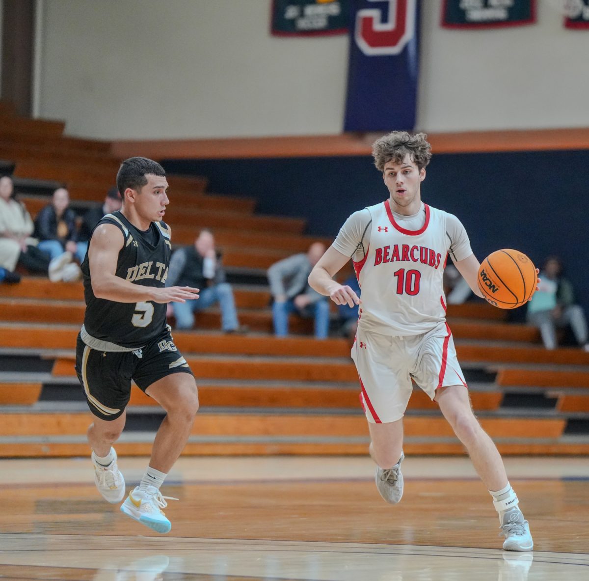 SRJC guard Jackson Smyth handles the ball inside of the three point line at Santa Rosa’s Haehl Pavilion Feb. 2, 2024