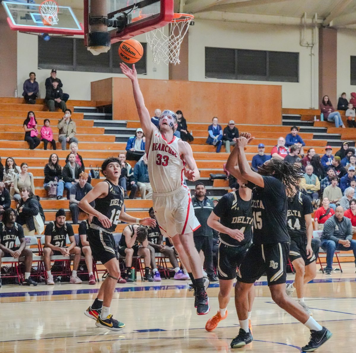 SRJC forward Justin Smith takes the ball inside for an attempted layup at Santa Rosa’s Haehl Pavilion Feb. 2, 2024