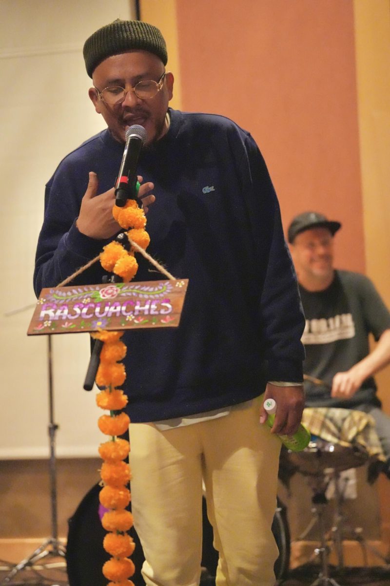 Spoken word artist Bocafloja is filled with inspiration as the band Rasquaches performs and walks onstage to freestyle at the Santa Rosa Junior College  Bertolini Student Services Center Feb. 9, 2024.