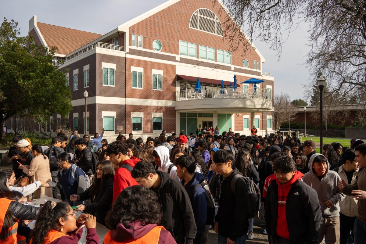 Students from all over the county, including The Athenian School in Contra Costa County, sign in at the Feb. 23 M.E.Ch.A. Conference on Santa Rosa Junior College.