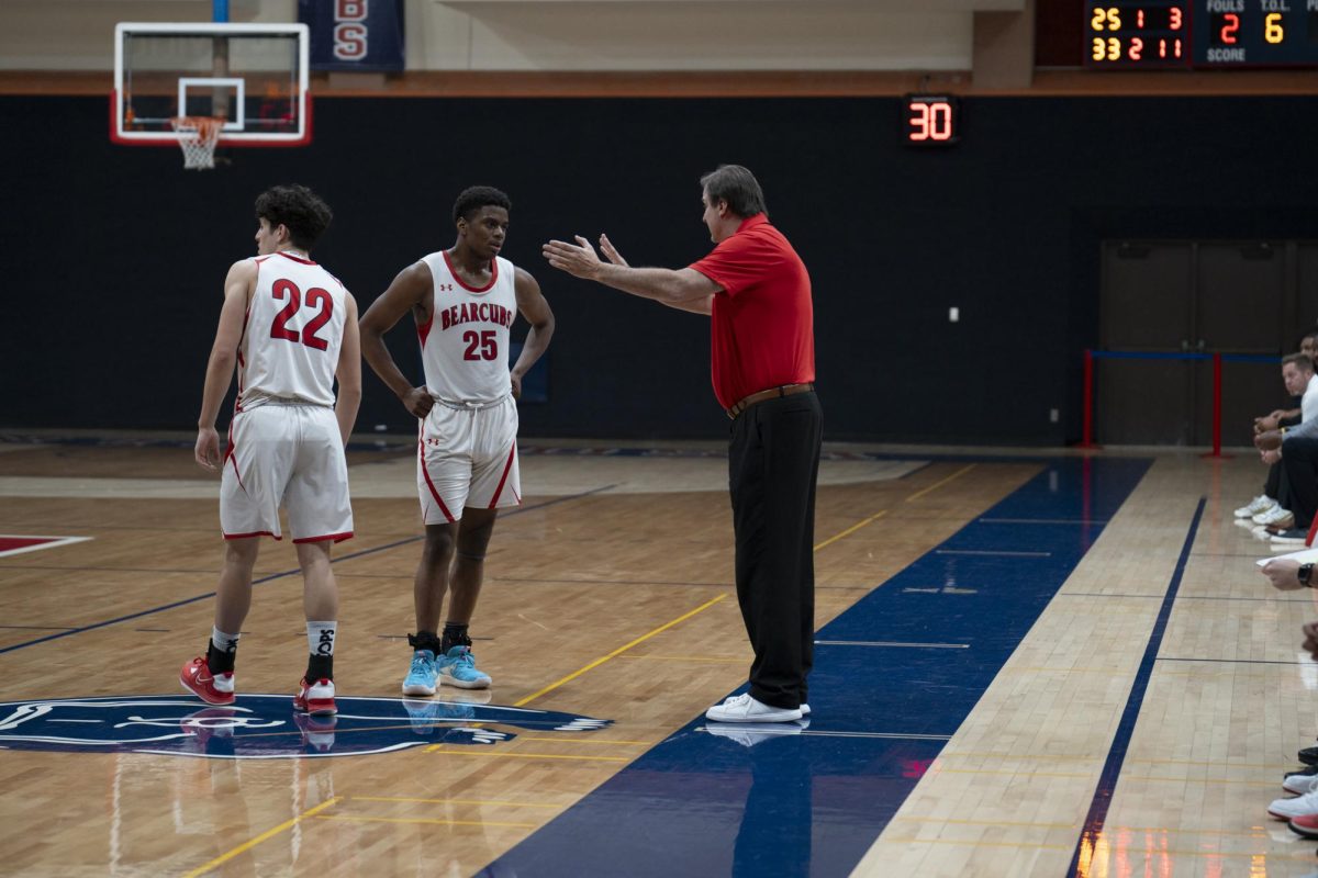 SRJC head coach Craig McMilan gives some instruction to starting guard Yatyn Anderson during a conference matchup against the Cosumnes River College Hawks at Haehl Pavillion on Feb. 6, 2024