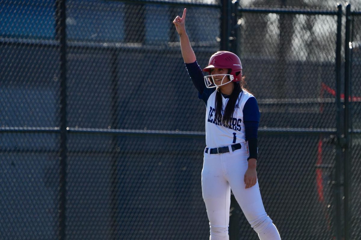 Centerfield Olivia Gabriel celebrates after securing third base on a wild pitch at Santa Rosa’s Marv Mayes Field Feb. 27, 2024. 