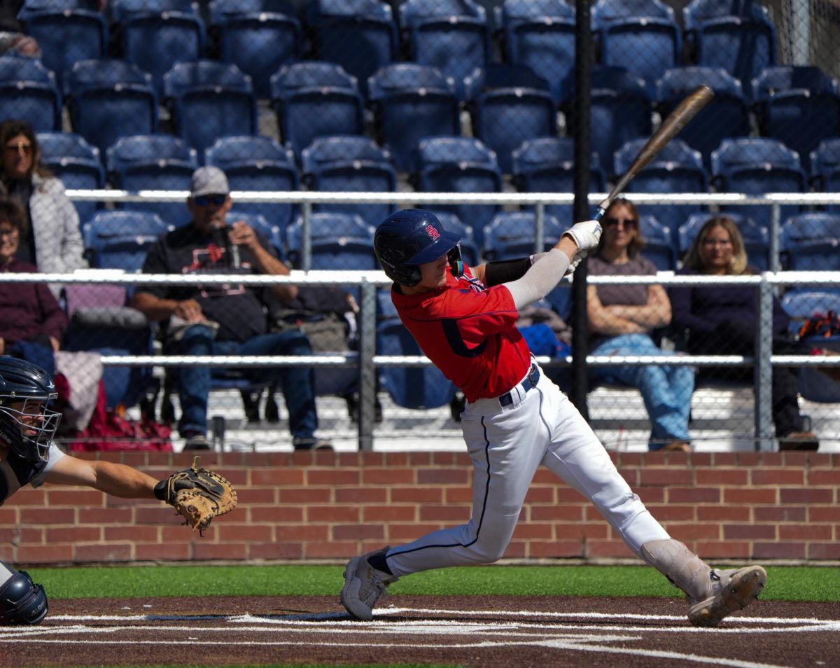 Aidan Lombardi singles out to left field in the bottom of the fifth inning against Cosumnes River College at Santa Rosa's Cook Sypher Field on Saturday, March 30, 2024.