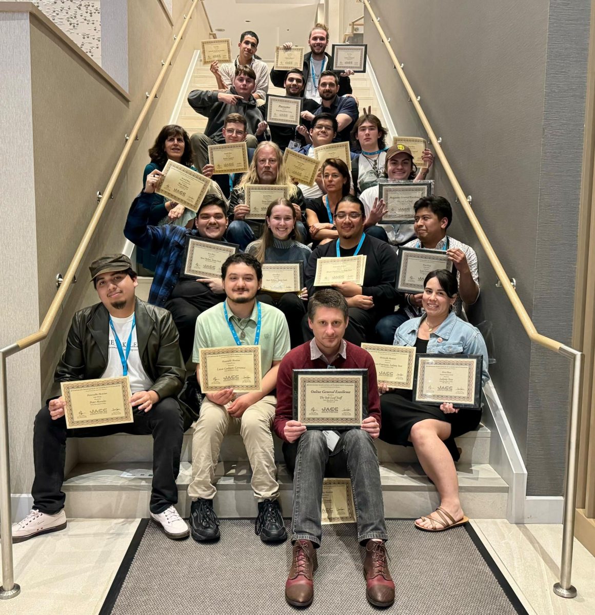 The staff of the Oak Leaf pose with their accolades after the Journalism Association of Community Colleges awards ceremony Saturday, March 9, 2024.