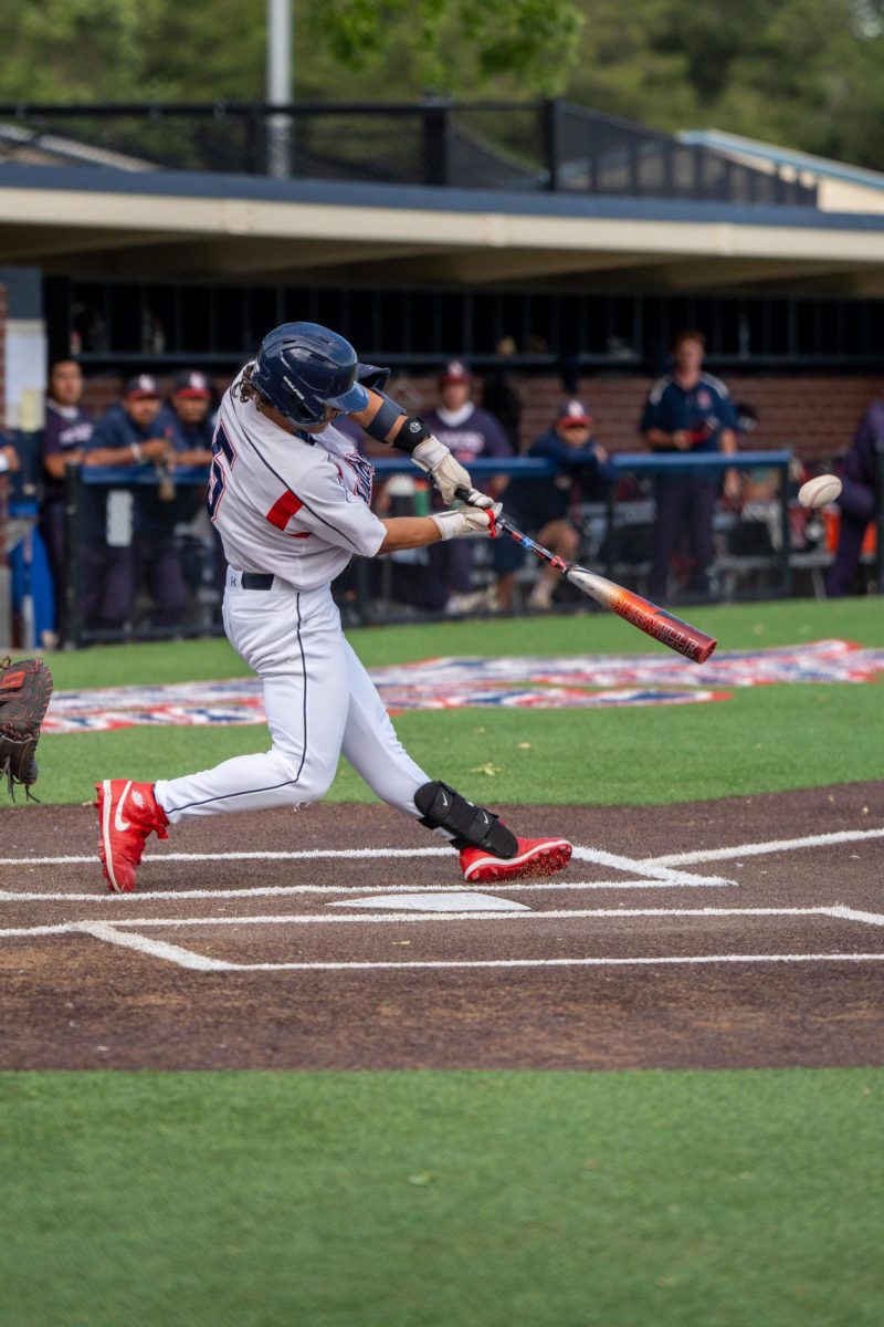 Gabe Henschel hits a single down centerfield in the bottom of the fourth against American River College at Santa Rosa's Cook Sypher Field on Thursday, April 25, 2024.
