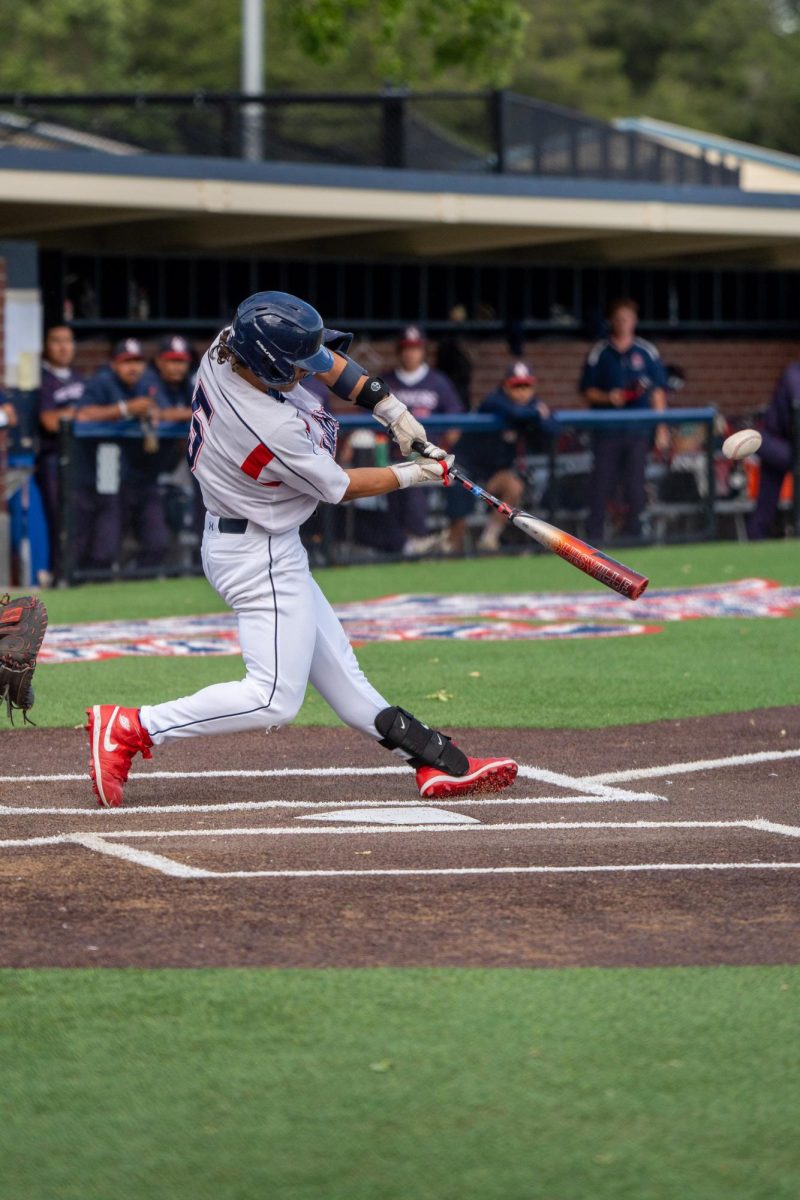 Gabe Henschel hits a single down centerfield in the bottom of the fourth against American River College at Santa Rosas Cook Sypher Field on Thursday, April 25, 2024.