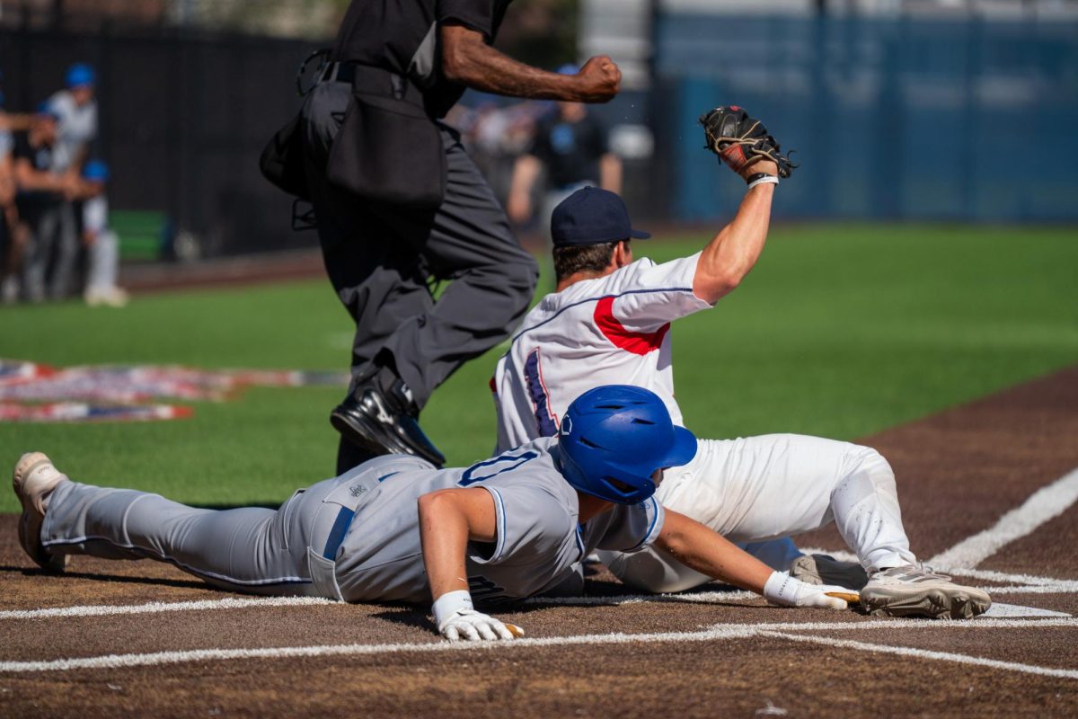 Pitcher Alex Leopard tags Modesto’s Bryce Campbell out at home after an attempted steal in the top of the seventh inning at Santa Rosa’s Cook Sypher Field on Thursday, April 11, 2024.