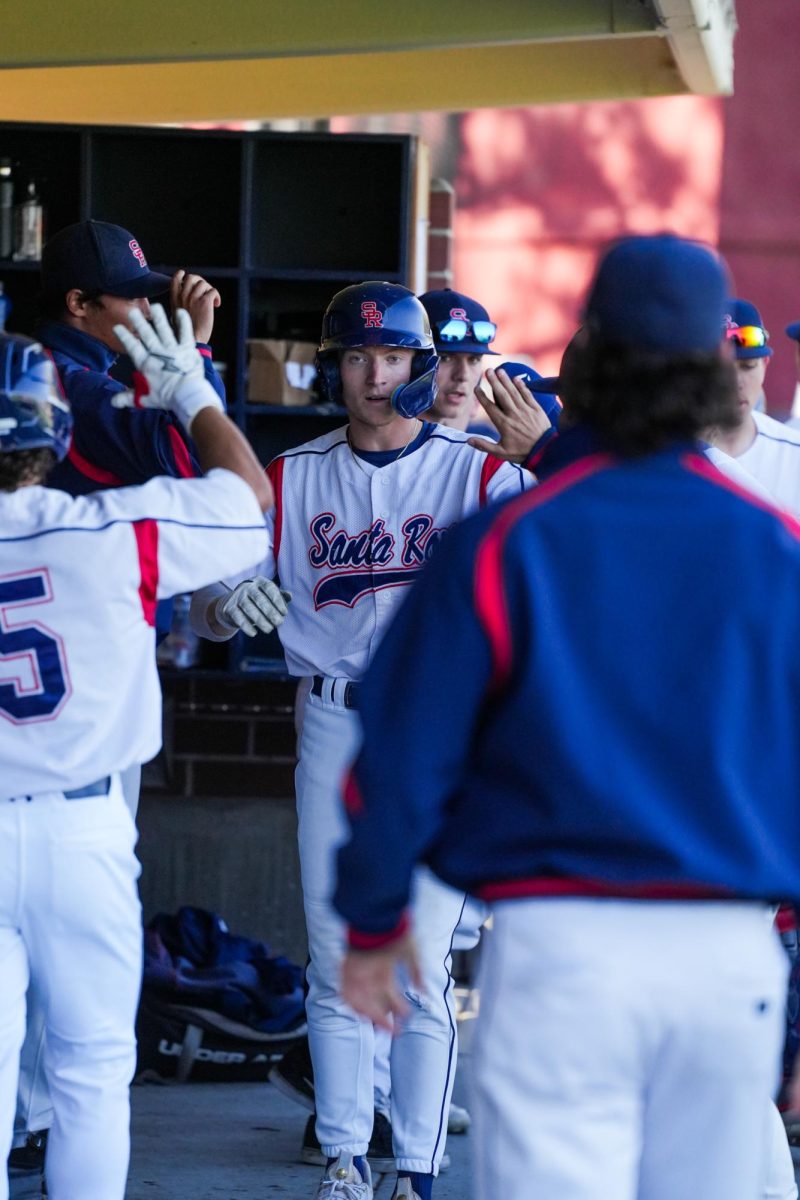 Aidan Lombardi walks back to the dugout after scoring on McCoy’s single to left field in the bottom of the ninth inning against San Joaquin Delta at Santa Rosa’s Cook Sypher Field on Tuesday, April 2, 2024.