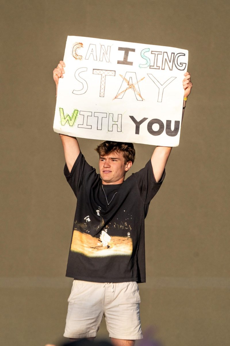 Kid Laroi invites a BottleRocker onstage after seeing a sign that reads, "Can I sing 'Stay' with you" at BottleRock Napa Valley on Saturday, May 25, 2024.