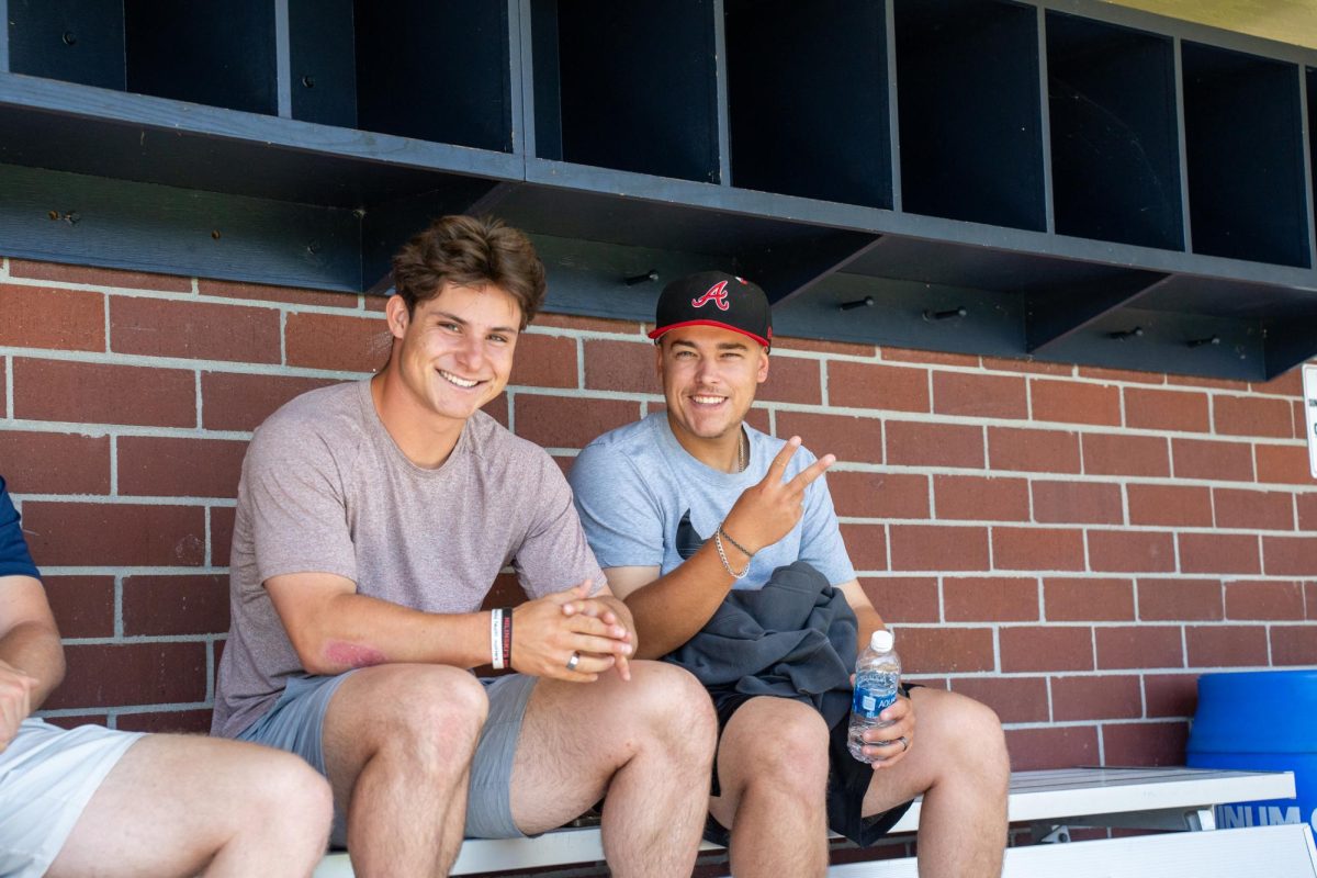 Alex Leopard and Jacob Greiner wait in the dugout as they wait for the final meeting of the season at Santa Rosa's Cook Sypher Field on Tuesday, May 14, 2024.