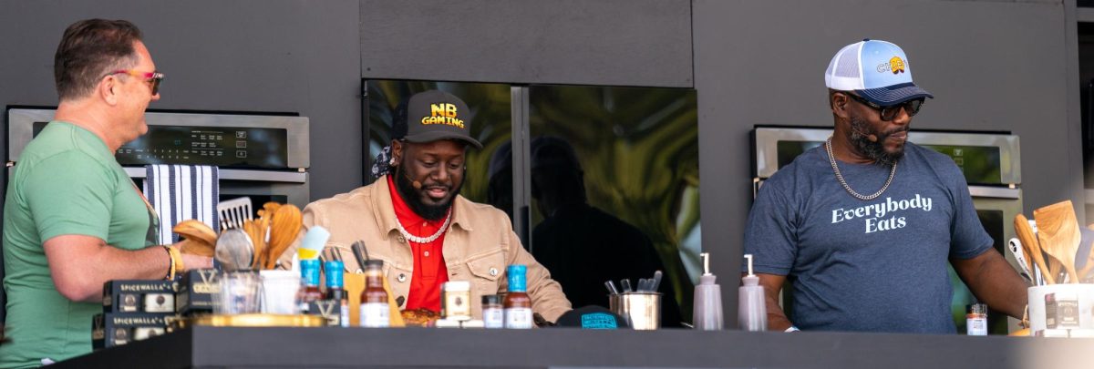 KCBS Radio's Foodie Chap Liam Mayclem,left, hosts T-Pain, middle, and Rodney Scott, right, on the Williams-Sonoma Culinary Stage at BottleRock Napa Valley on Saturday, May 25, 2024.