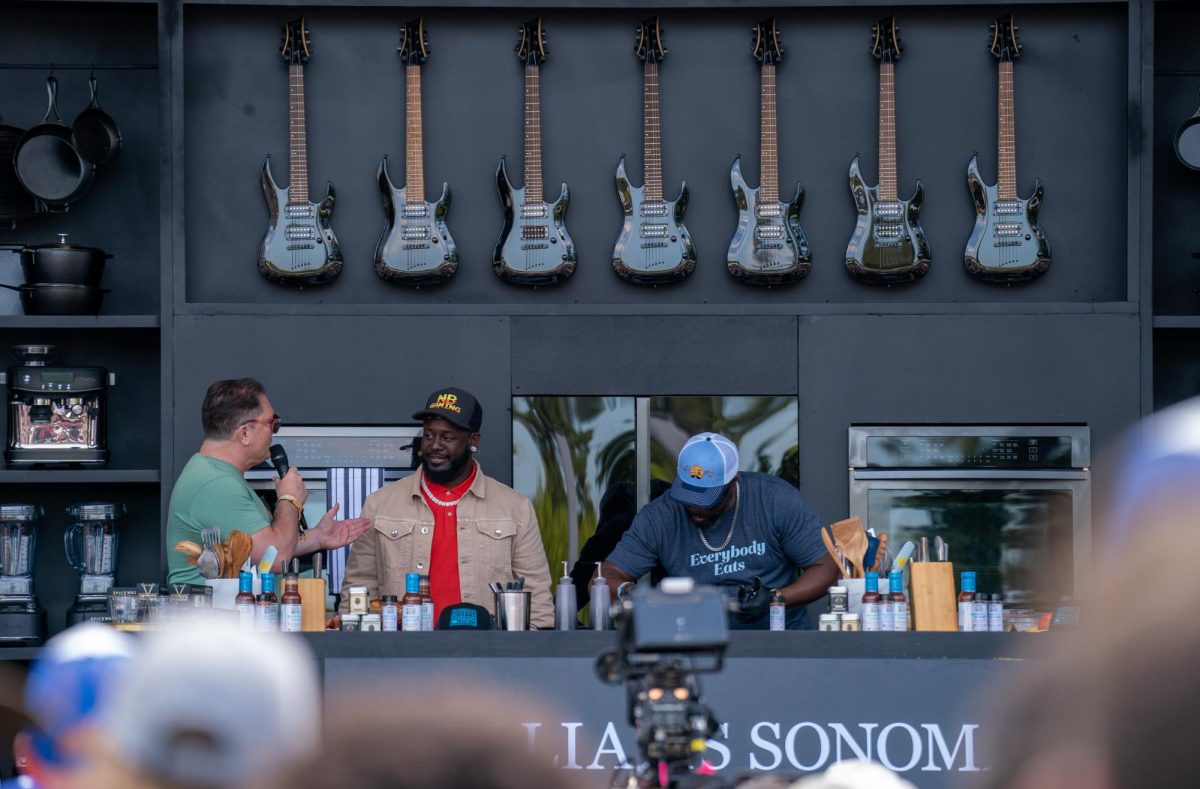 KCBS Radio's Foodie Chap Liam Mayclem,left, hosts T-Pain, middle, and Rodney Scott, right, on the Williams-Sonoma Culinary Stage at BottleRock Napa Valley on Saturday, May 25, 2024.