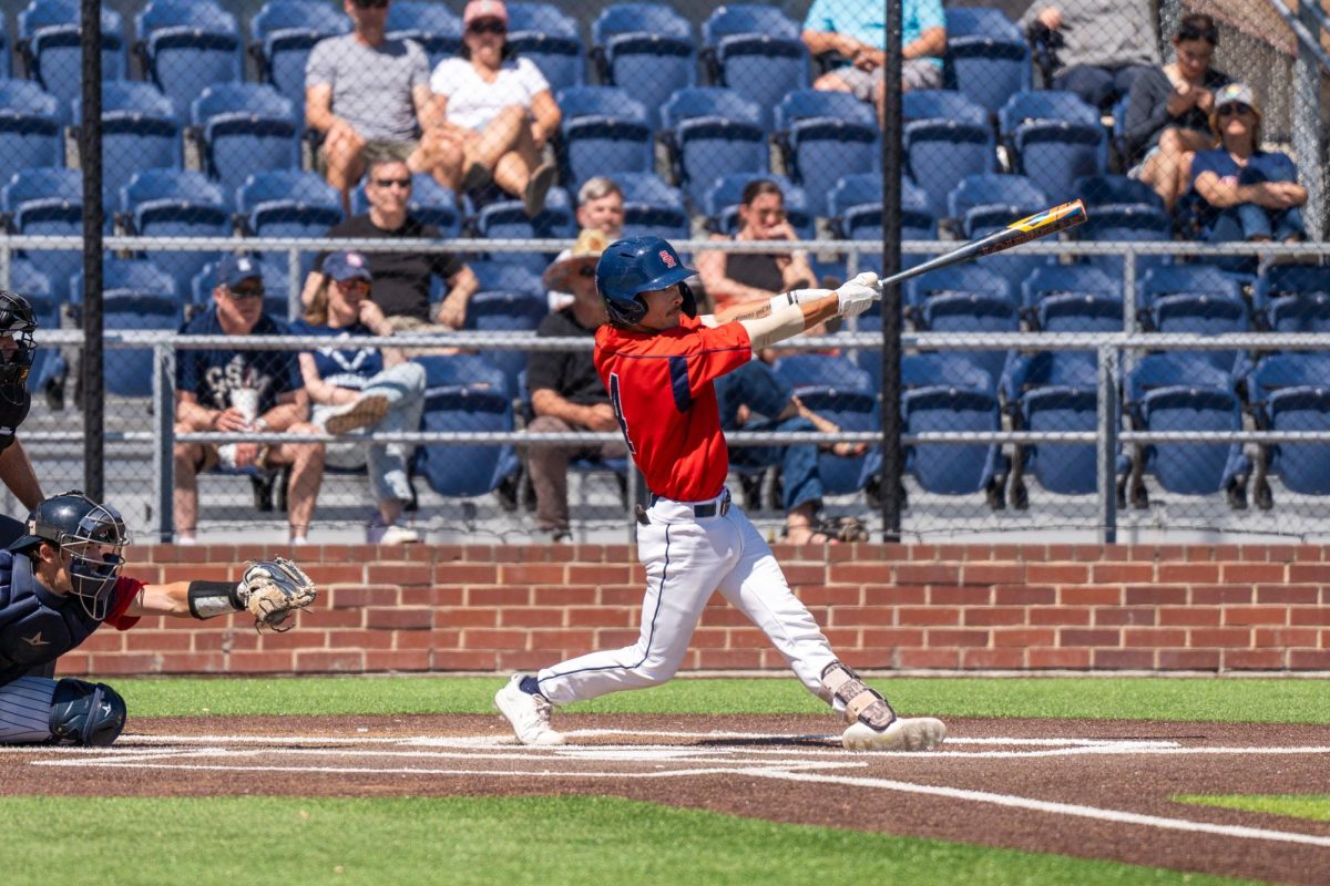 Catcher Cameron Duran hits a double to left field in the bottom of the third against College of San Mateo in the final game of the CCCAA Regional Playoffs at home on Friday, May 3, 2024.