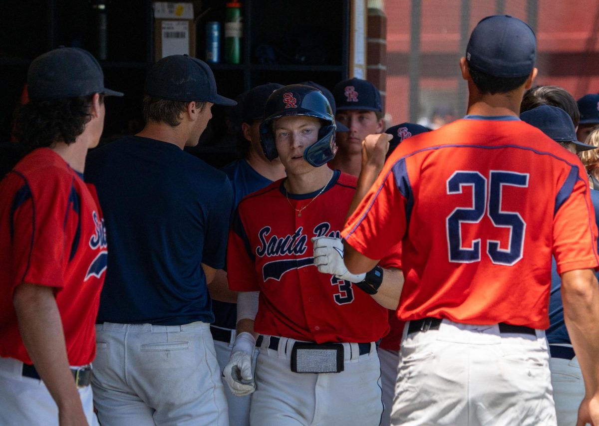  Lombardi is greeted with solemnity in the dugout after his home run as the Bear Cubs split the series and force a game 3 against College of San Mateo in game 2 of the CCCAA Regional Playoffs at home on Friday, May 3, 2024.