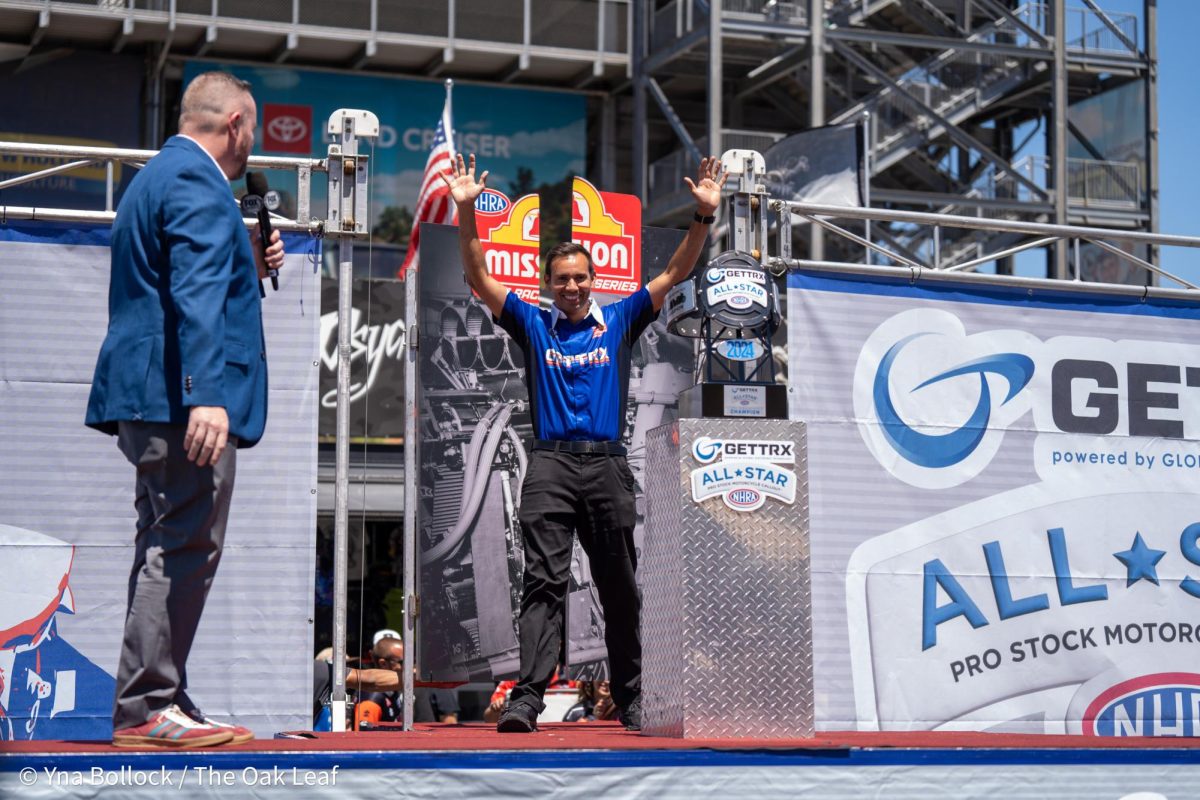 NHRA Pro Stock Motorcyle driver Hector Arana Jr. waves to the crowd on the GETTRX NHRA All-Star Pro Stock Motorcycle Callout stage at Sonoma Raceway on Friday, July 26, 2024 in Sonoma.