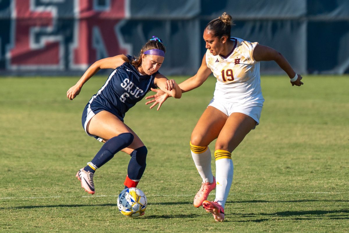Bear Cubs midfielder/forward Olivia Hohnstein working to create space against Hartnell’s Kiana Varela on Sept. 24, 2024