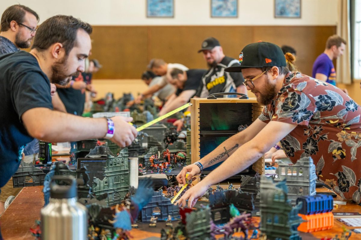 Participants prepare for the "Warhammer 40k" tournament at Sonoma Con in Santa Rosa on Saturday, Aug. 31, 2024.