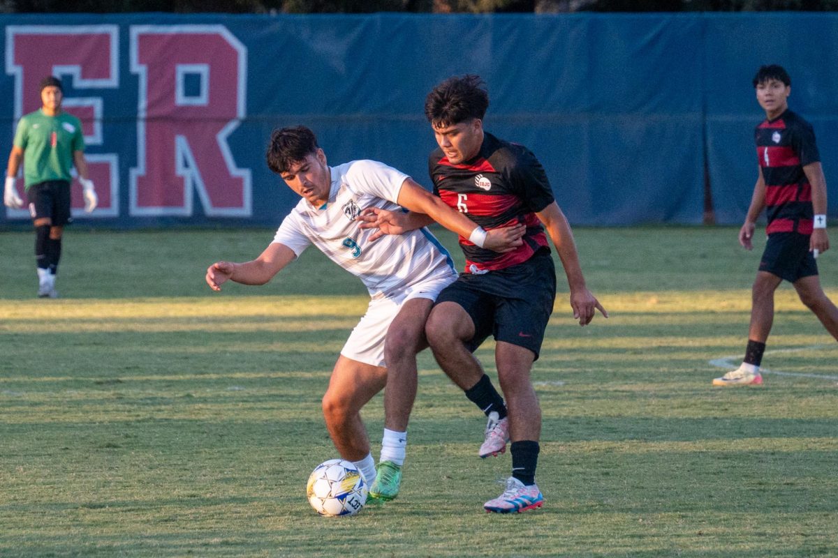 Bear Cubs midfielder Dominic Sanchez fights for possession of the ball against Folsom Lake on Friday, Oct. 18, 2024.