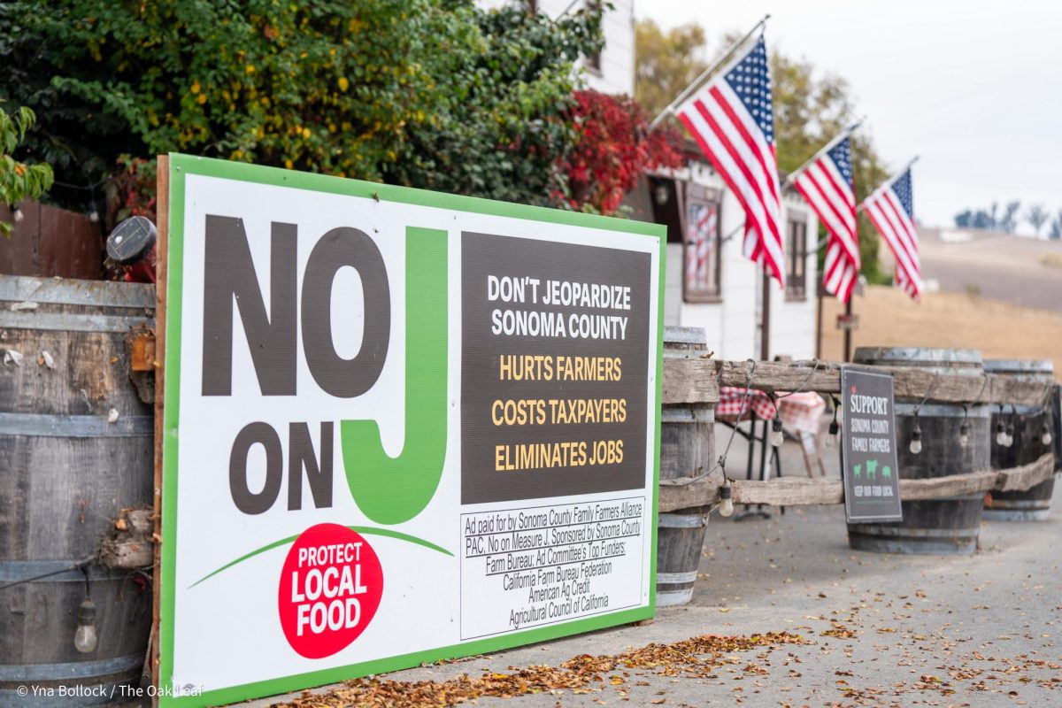 Dinucci's Restaurant in Valley Ford displays a 'No on J' billboard parallel to their outdoor dining in support of No on Measure J