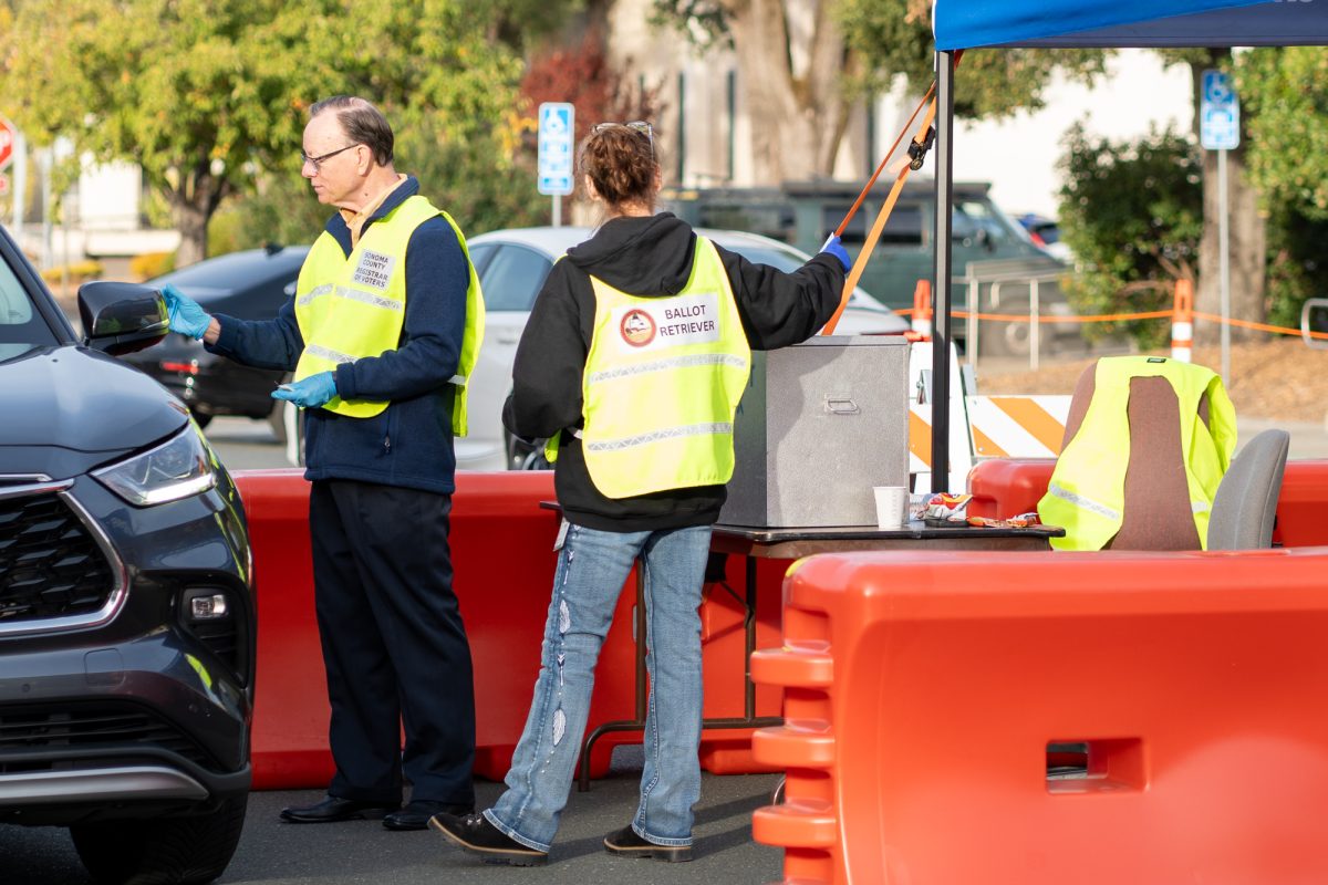 Ballot retrievers collect votes during the November Presidential Election at the Registrar of Voters in Santa Rosa on Tuesday, Nov. 5, 2024. 