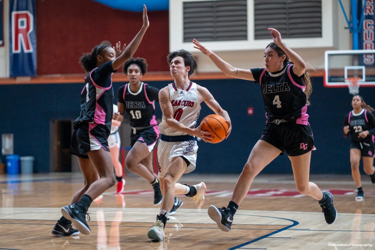 Bear Cubs guard Cele Urzua bursts into the paint, being guarded heavily as they look to fight back against San Joaquin Delta at Haehl Pavilion on Friday, Jan. 24, 2025. 