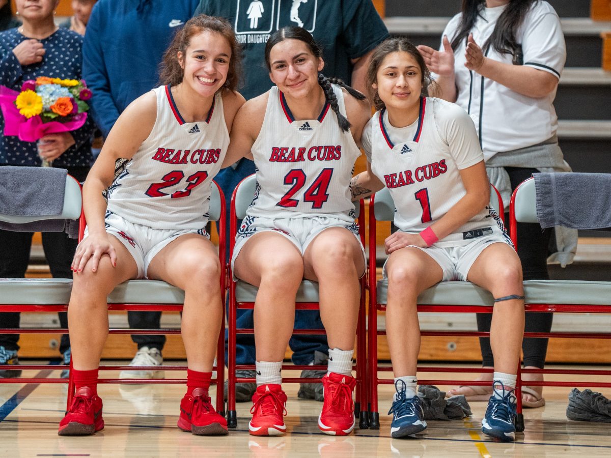From left to right, sophomores Ivy Gonzalez, Cece Solano and Lindsey Arellano pose for a photo ahead of the game against American River at home on Friday, Feb. 21, 2025.