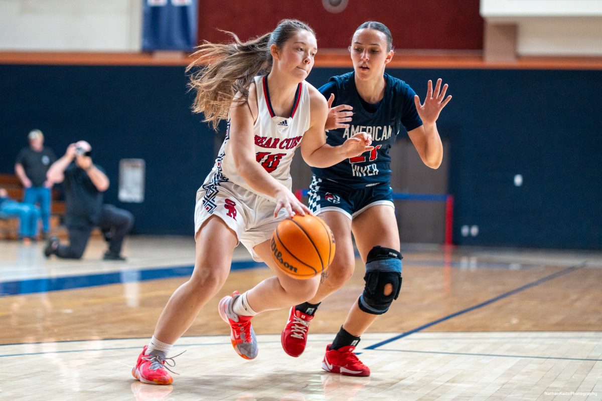 SRJC's guard Shasta Vlasak holds off American River's guard Shylaya Banks as she pushes towards the rim at Haehl Pavilion on Friday, Feb. 21, 2025.