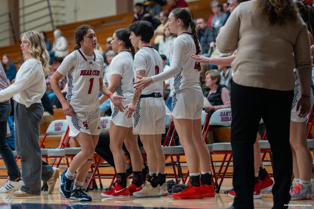 SRJC's guard Lindsey Arellano returns to the bench after a strong performance against American River at Haehl Pavilion on Friday, Feb. 21, 2025.