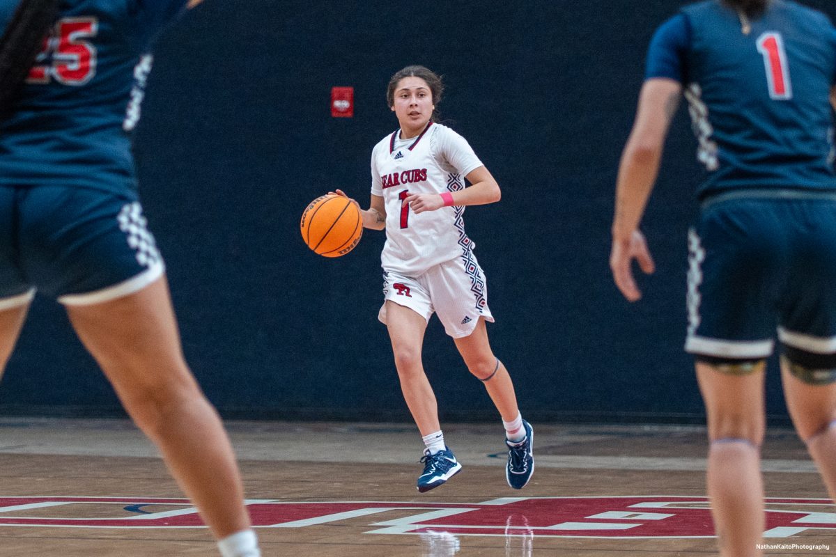 Bear Cubs' guard Lindsey Arellano carries the ball up the court and looks to build an attack against American River at Haehl Pavilion on Friday, Feb. 21, 2025.