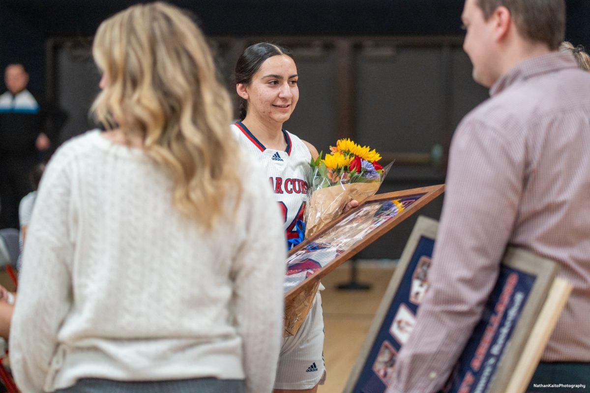 Bear Cubs' forward Cece Solano recieves her recognizition for playing two seasons with SRJC before their game against American River at Haehl Pavilion on Friday, Feb. 21, 2025.