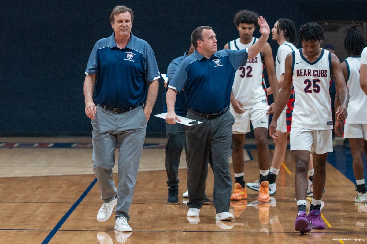 Bear Cubs' head coach Craig McMillian and the rest of the team heads towads the dressing room following an emphatic win over American River at Haehl Pavilion on Friday, Feb. 21, 2025.